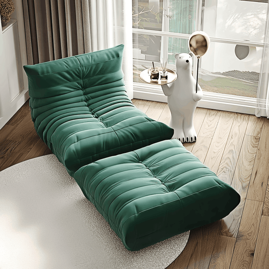 Green suede Caterpillar armchair and ottoman set in modern living room with wooden floor and decorative bear lamp