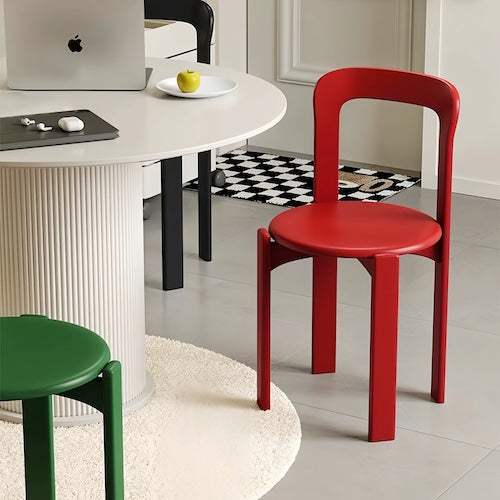 Eco-chic beech wood dining chairs in bold red and green colors, modern design