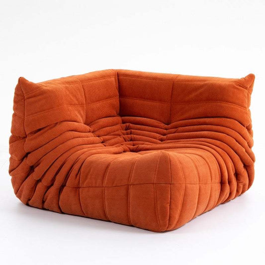 Modern cozy suede corner Caterpillar sofa with high-density foam and premium upholstery in living room.