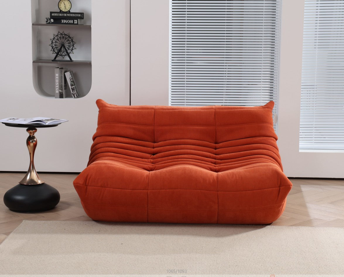 Modern Togo loveseat sofa with ergonomic design and premium upholstery, perfect two-seater caterpillar sofa for living spaces